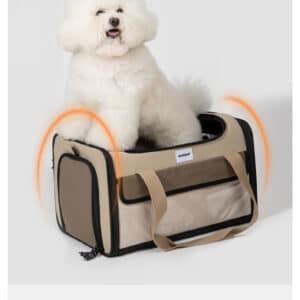 Adorable fluffy dog relaxing in a stylish, durable pet carrier with ventilation features.