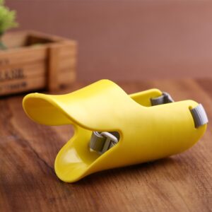 Vibrant yellow kitchen gadget for easy serving, lifting, and mixing, with ergonomic gray grips.