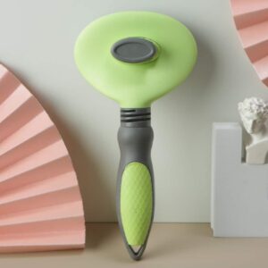 Ergonomic green cleaning tool with stylish design and soft pink accents for modern homes.