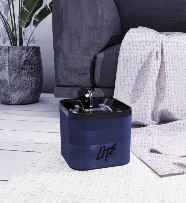 Sleek navy container with Life design enhances modern living rooms cozy, elegant vibe.