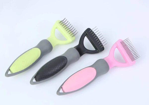 Ergonomic pet grooming tools in vibrant yellow, sleek black, and soft pink for easy detangling.