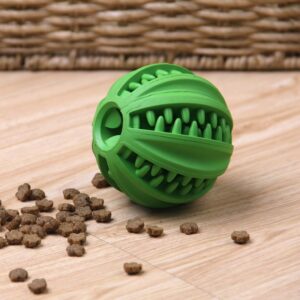 Vibrant green pet ball with kibble, promoting interactive play on a wooden floor.