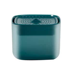 Modern teal storage container with rounded edges and perforated lid for versatile use.